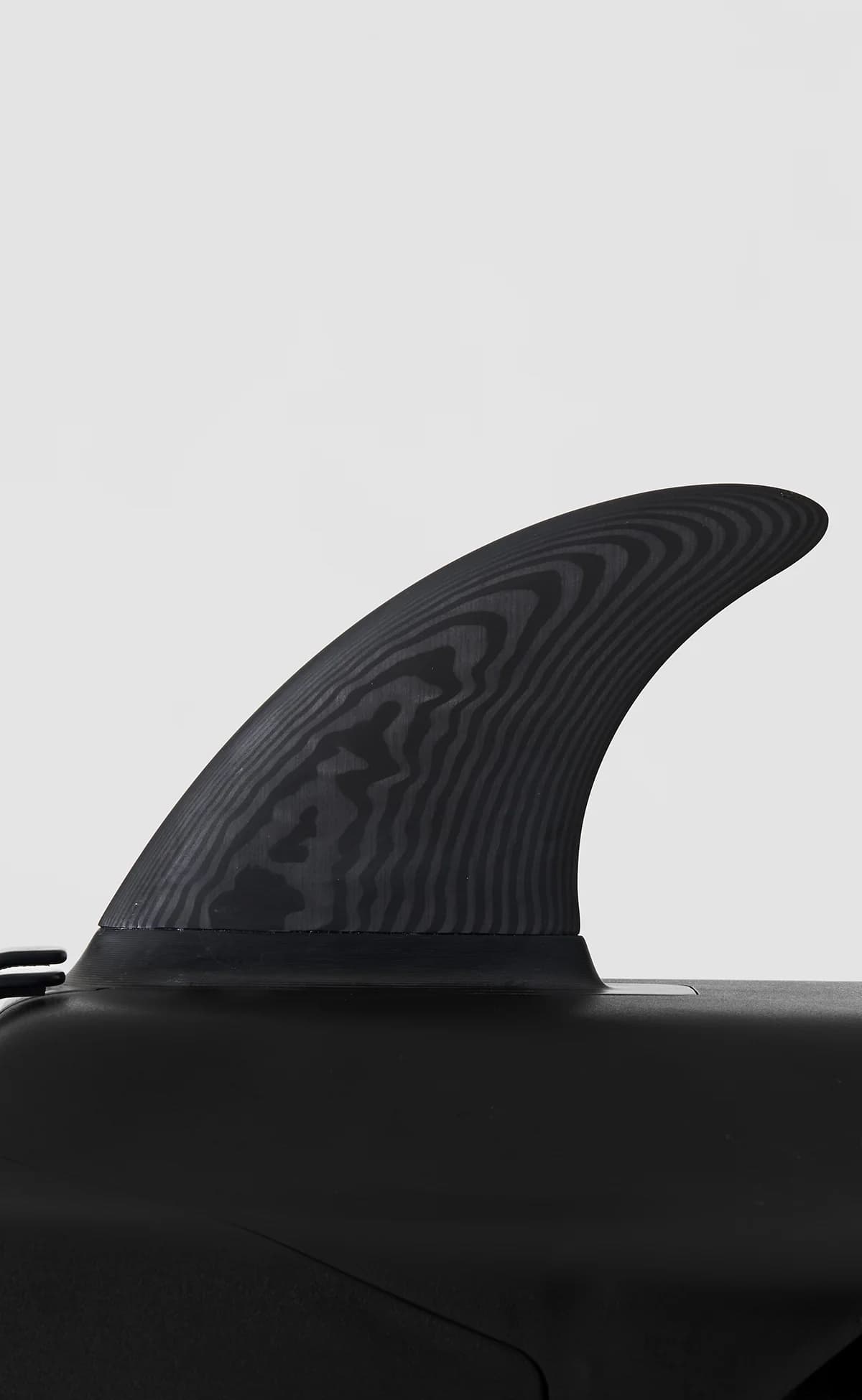 Close-up of the black Lind fin with a wood-grain pattern